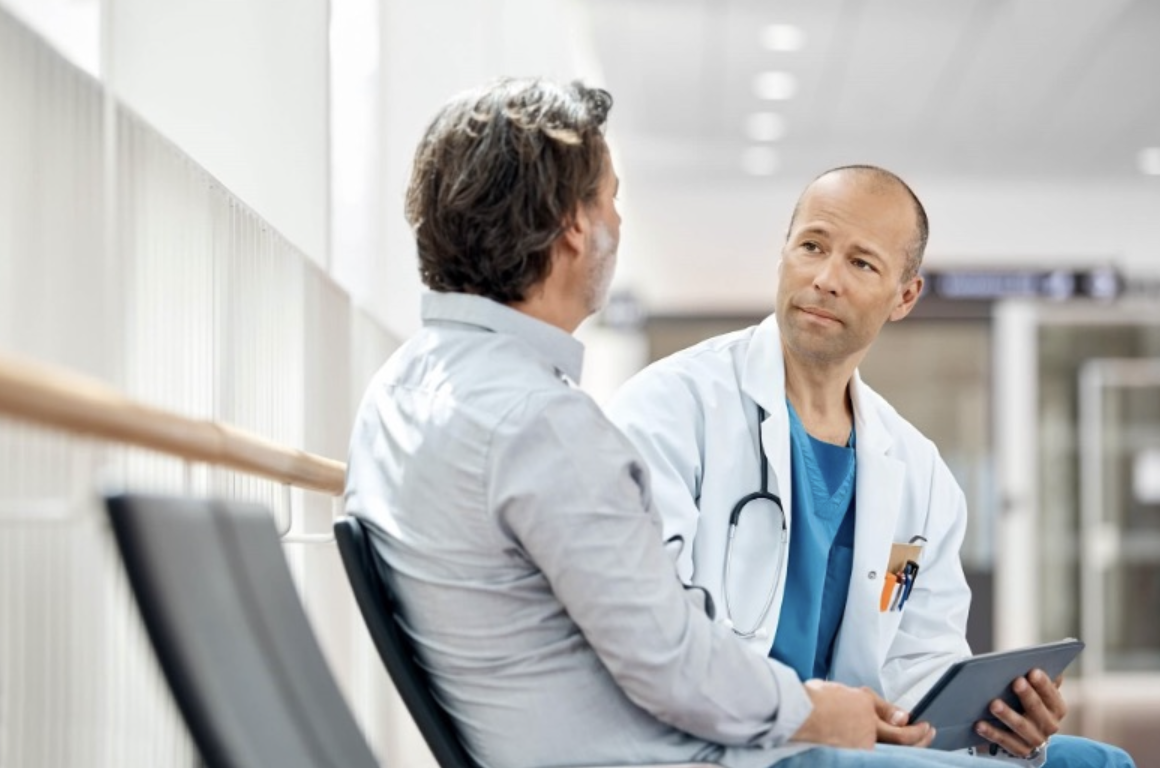 Doctor consulting patient