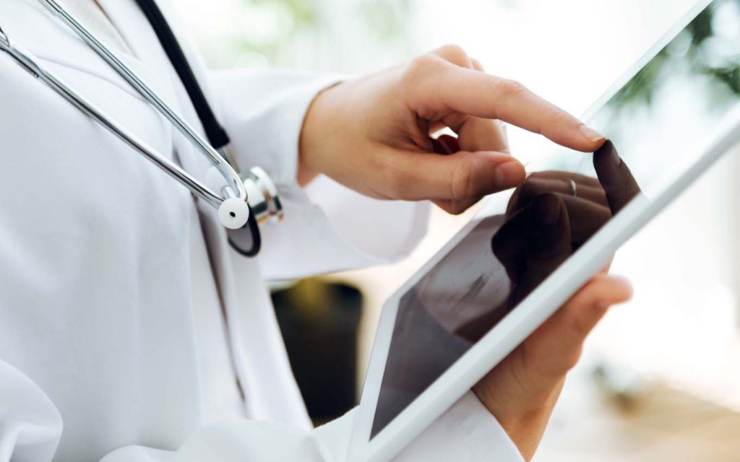 Doctor with tablet